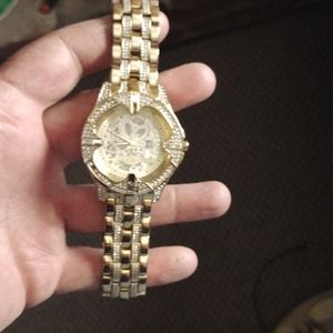 Gold watch with jworski crystal